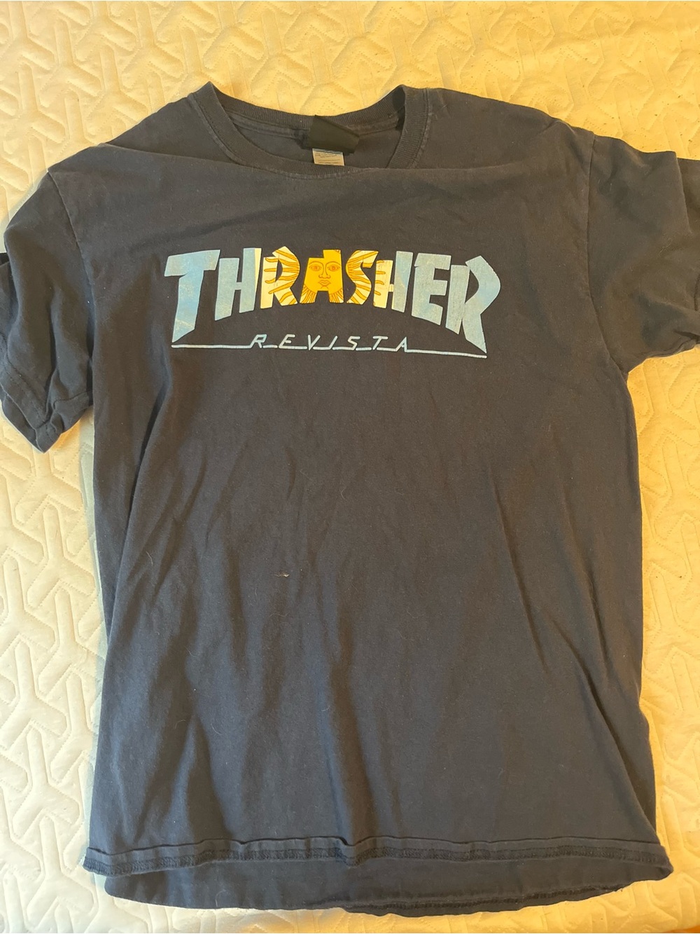 Thrasher navy Tee with Blue and Yellow Revista Logo